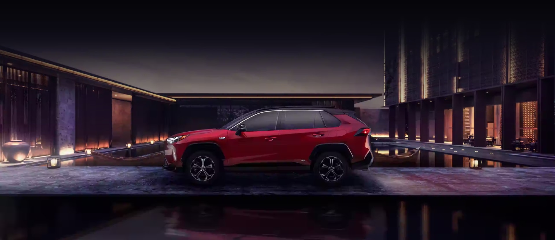  RAV4 Prime XSE shown in Supersonic Red with Midnight Black Metallic rood